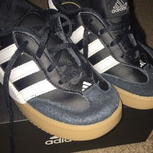 Size 9.5 adidas shoes , good condition as is